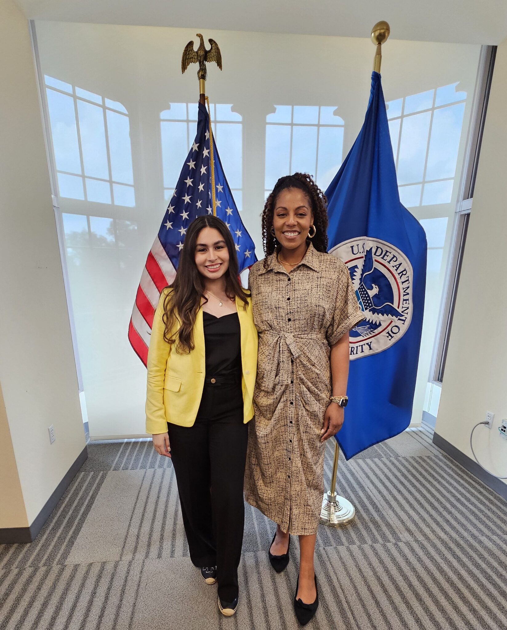 Fellow Denisse Amezquita stands with Brandi Bynum, Unit Chief of Strategic Communications at the DHS Center for Countering Human Trafficking.